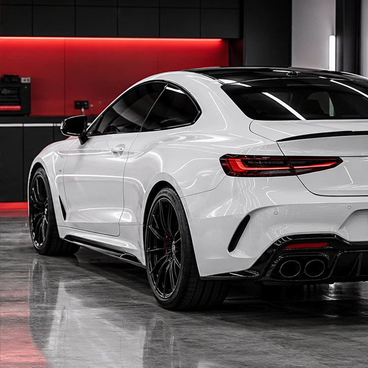 Illustrative white coupe with a pristine finish